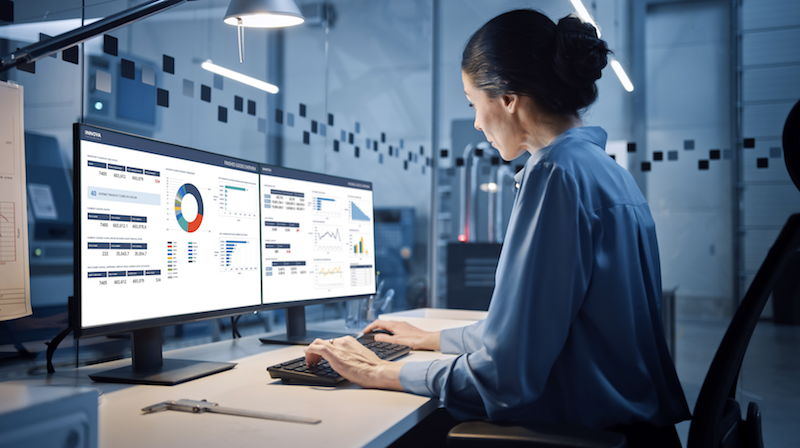 women using computer to control systems