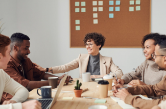 woman at the head of the table soft skills