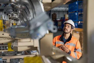 Technician checking production line
