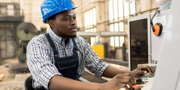 Image of technician working at a computer